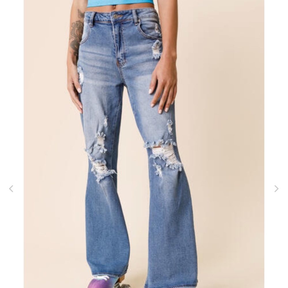 Flared distressed jeans. Worn only once
